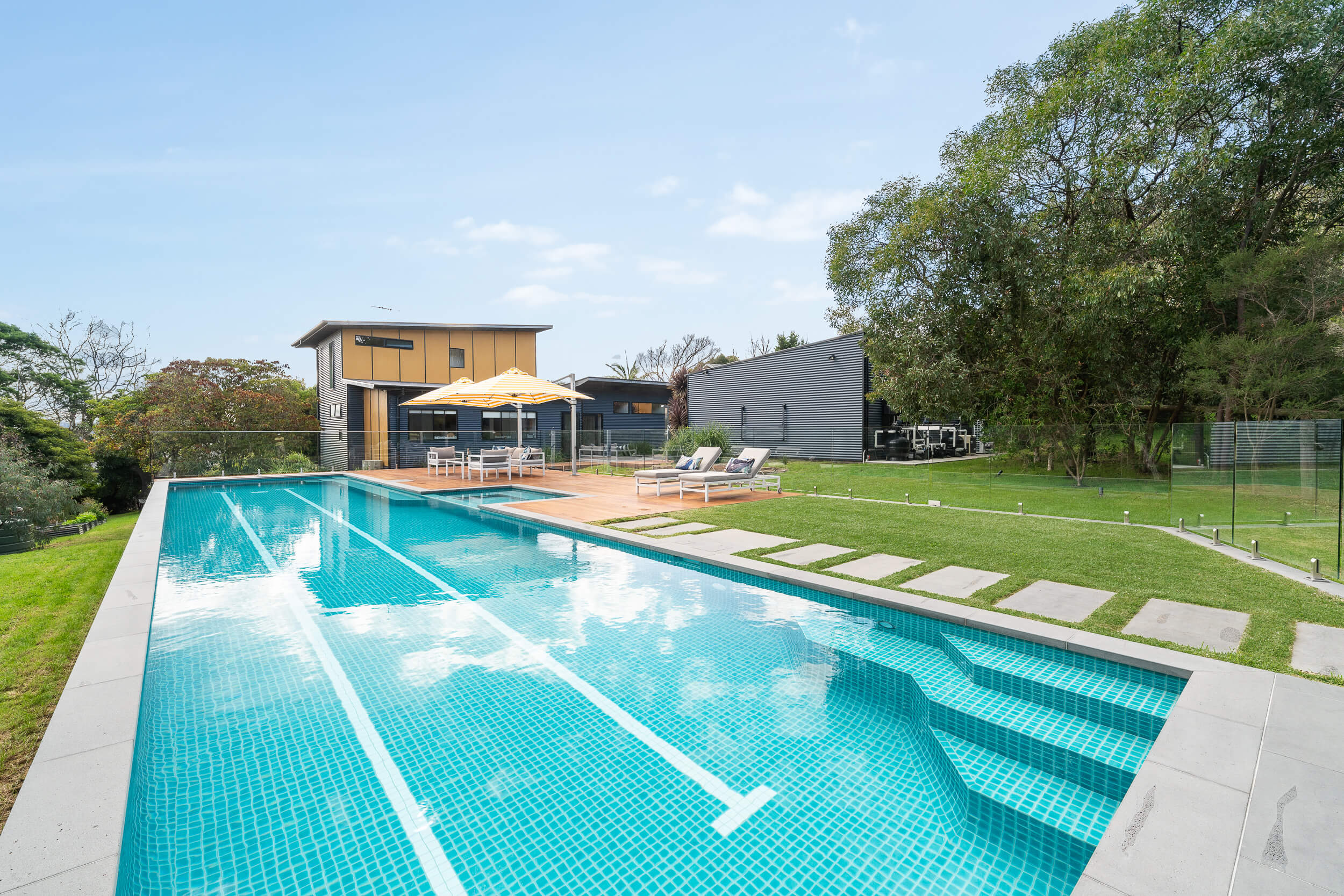 Completed swimming pool, spa and wooden decking entertainment area at Mount Martha.