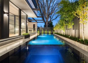 Looking back at the completed swimming pool, spa and landscape design project in Toorak, Victoria.